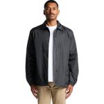 A black coach jacket featuring a button-up front and a relaxed fit, worn by a model.
