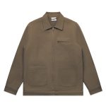 A heavy canvas jacket in a muted brown colour, featuring a zip front, two front pockets, and a chest pocket.