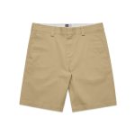 Beige work shorts featuring a classic cut with front pockets and a logo on the waistband.