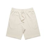 Light beige sports shorts with an elastic waistband and drawstring, featuring a logo on one side.