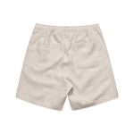 Linen shorts in a light beige colour featuring an elastic waistband and two back pockets.