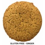 A gluten-free ginger biscuit, round and golden brown, displayed against a white background.