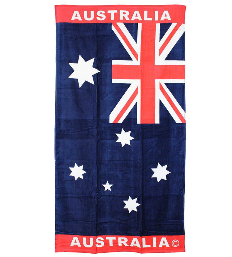 A navy blue beach towel featuring the Australian flag and stars, with a logo present. Beach Towel - Image 1