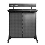 A black exhibition gondola with a perforated design, featuring a top shelf and wheels for mobility.