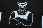 A black T-shirt featuring a bold, stylised graphic of a muscular figure with crossed arms.