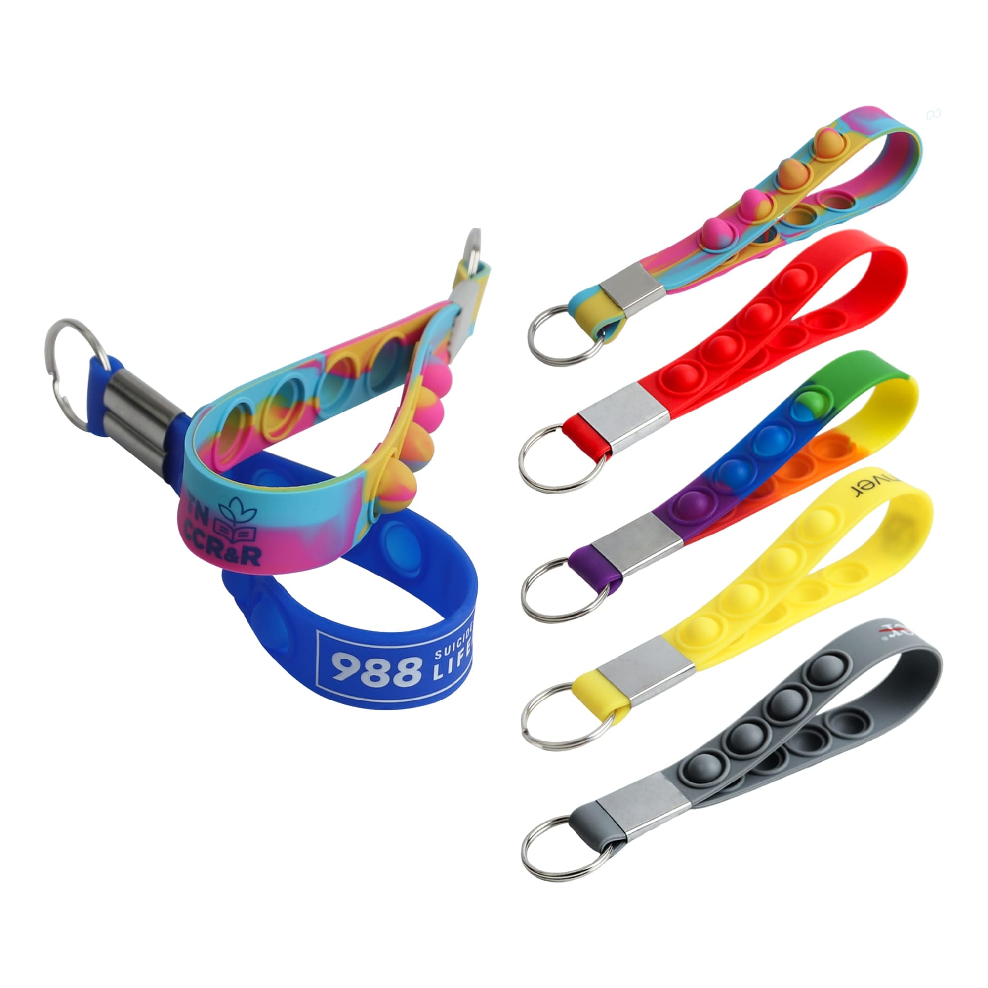 A set of colourful popper stress reliever keyrings in various colours, including rainbow, red, yellow, and grey. Popper Stress Reliever Keyring - Image 1