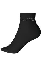 A pair of black organic sneaker socks with a branding logo on the side.