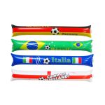A set of inflatable bang sticks in red, green, blue, and yellow, featuring football designs and country-themed patterns.
