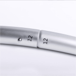 A silver circular frame showing connectors, with the number "12" printed on it. The frame has a metallic finish.