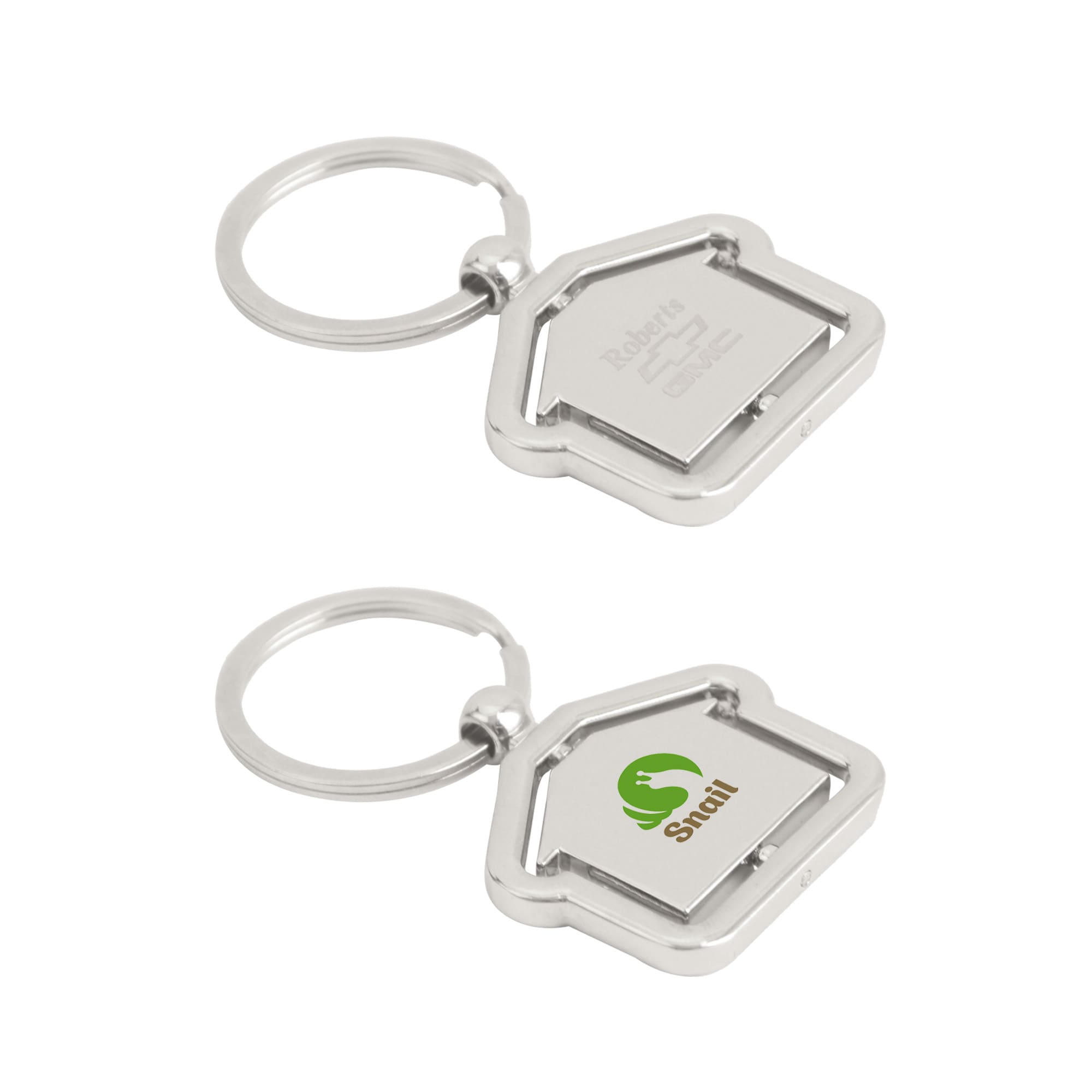 A metal keyring shaped like a house, featuring a green logo, in a silver finish. Spinning House Metal Keyring - Image 1