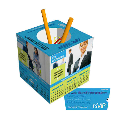 A blue and yellow cube pen holder with pencils, featuring branding and calendar designs on its sides. Pop Up Cube Pen Holder - Image 1