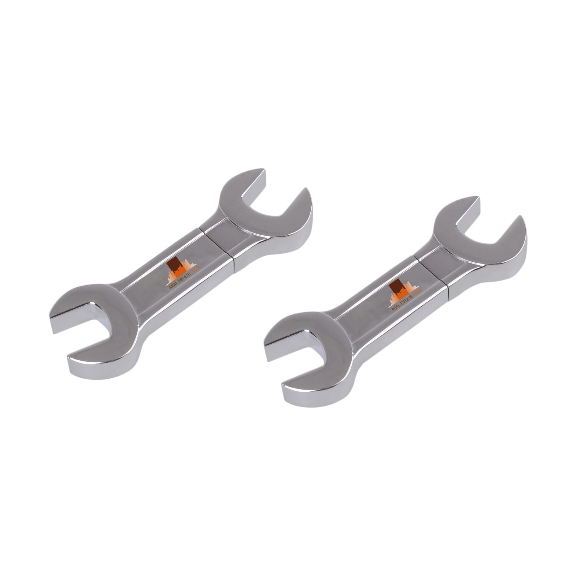 A dual spanner flash drive in silver colour, featuring a metallic finish and a branding logo in the centre. Dual Spanner Flash Drive - Image 1