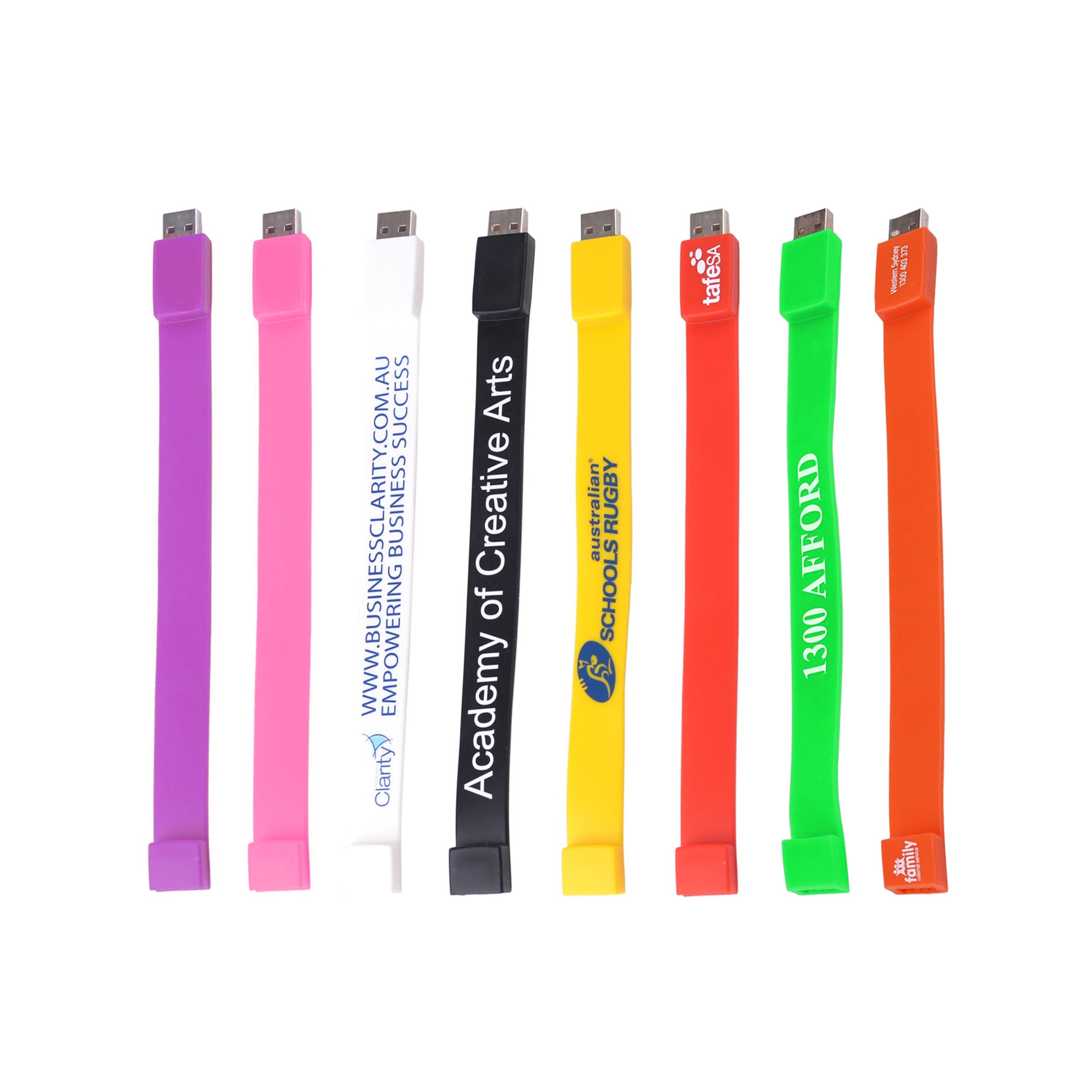 A variety of rectangular silicone wristband flash drives in colours including pink, white, yellow, green, orange, and purple, each with logos. Rectangular Silicone Wristband Flash Drive - Image 1