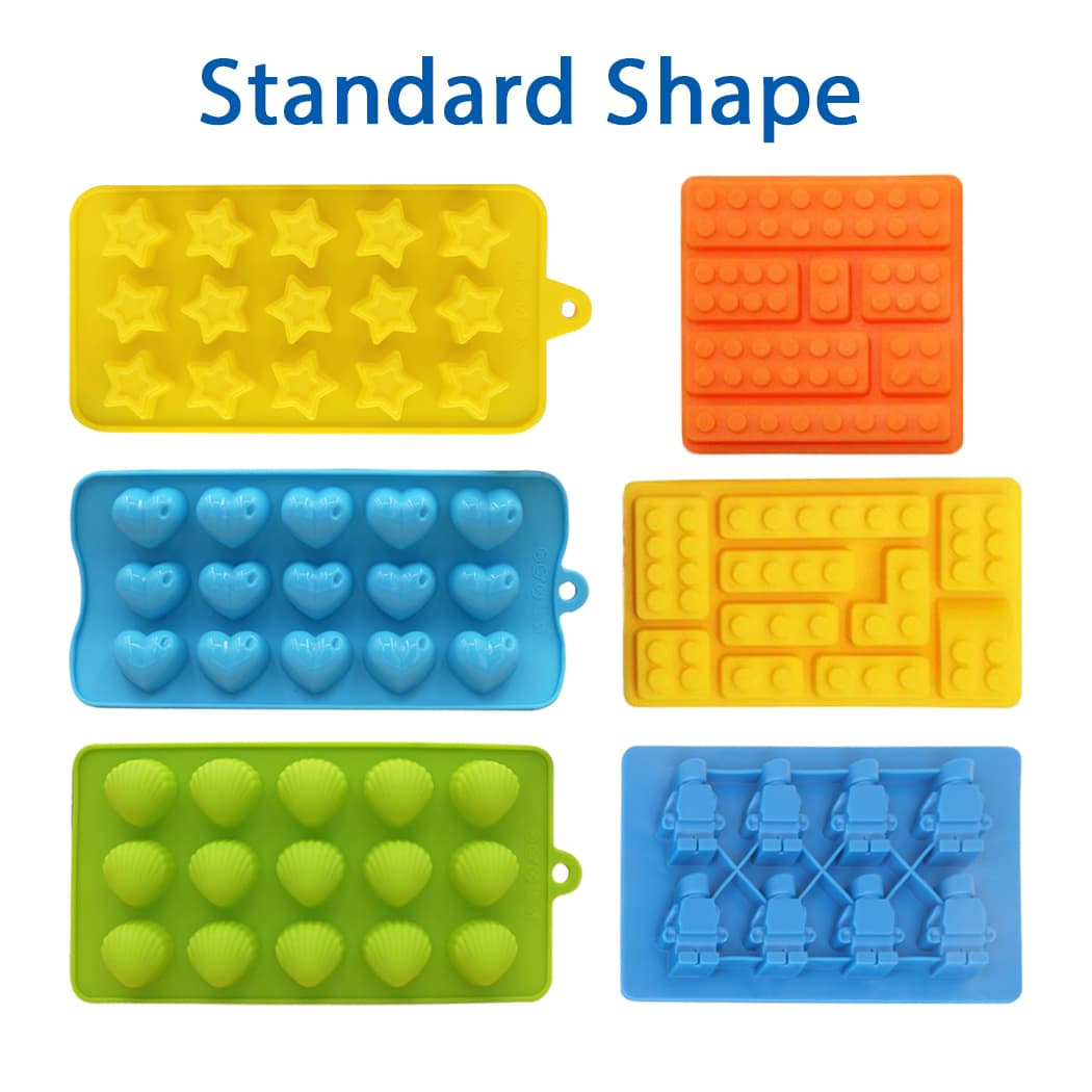 Custom shaped moulded ice cube trays in vibrant colours: yellow stars, blue hearts, green shells, orange and blue brick designs. Ice Cube Tray - Image 1