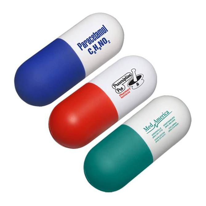 A capsule-shaped stress reliever in blue, red, and green, featuring a logo on the surface. Capsule Shape Stress Reliever - Image 1
