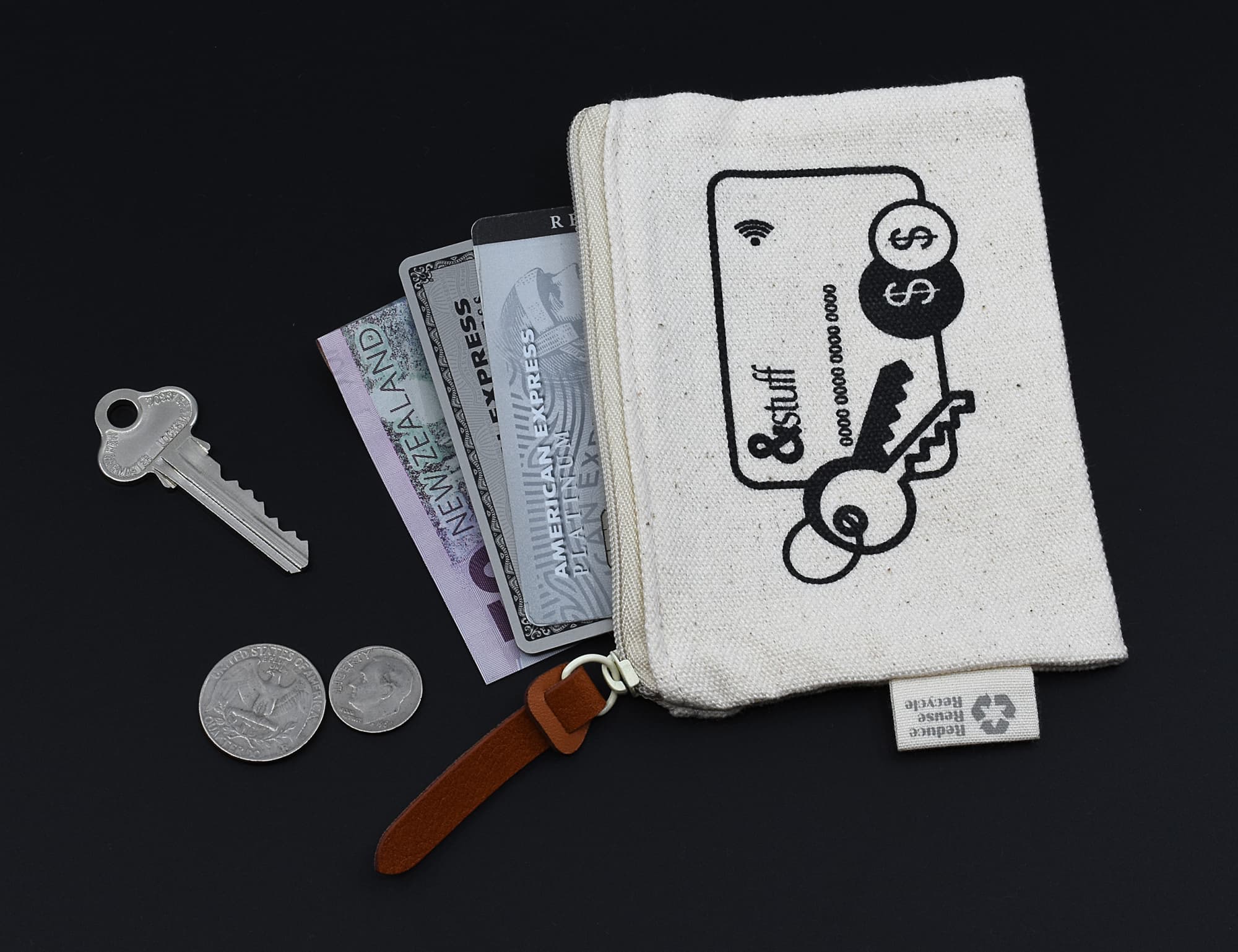 A small cream pouch with a key, coins, and cards partially visible inside, featuring a simple graphic design and a logo. Calico Card & Key Pouch 8.5cm x 13cm - Image 1