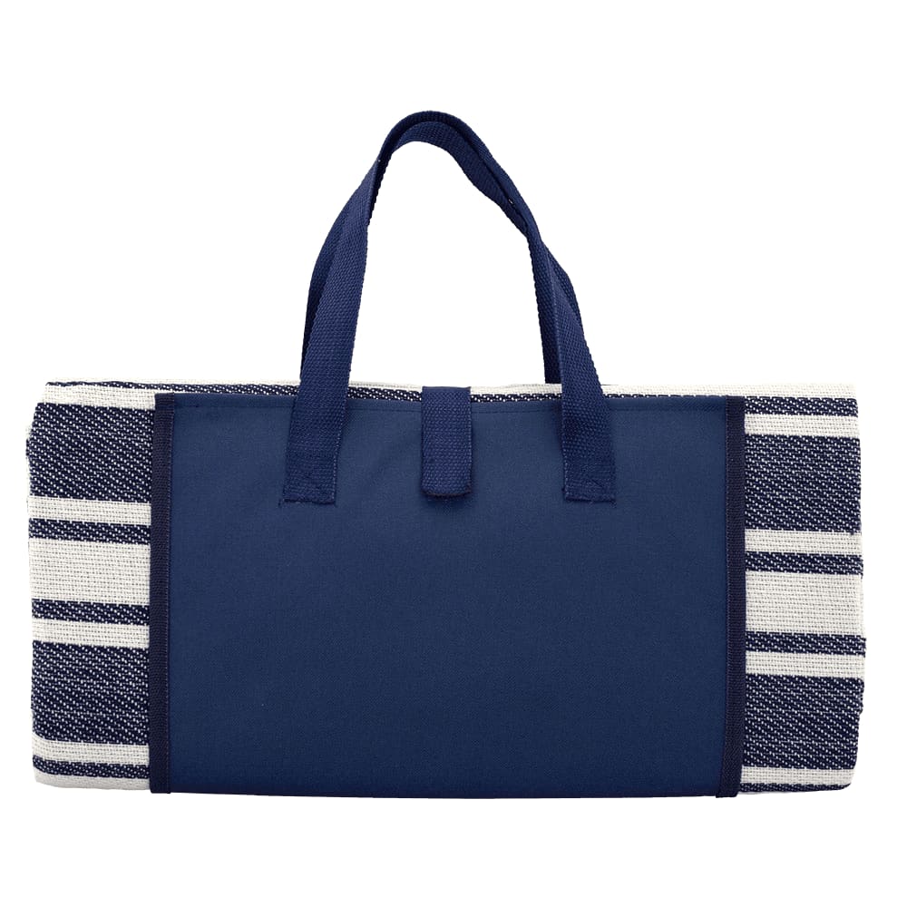 A navy picnic rug with a striped design and carrying handles. It features a branding logo. Trekk Round Picnic Rug - Image 1
