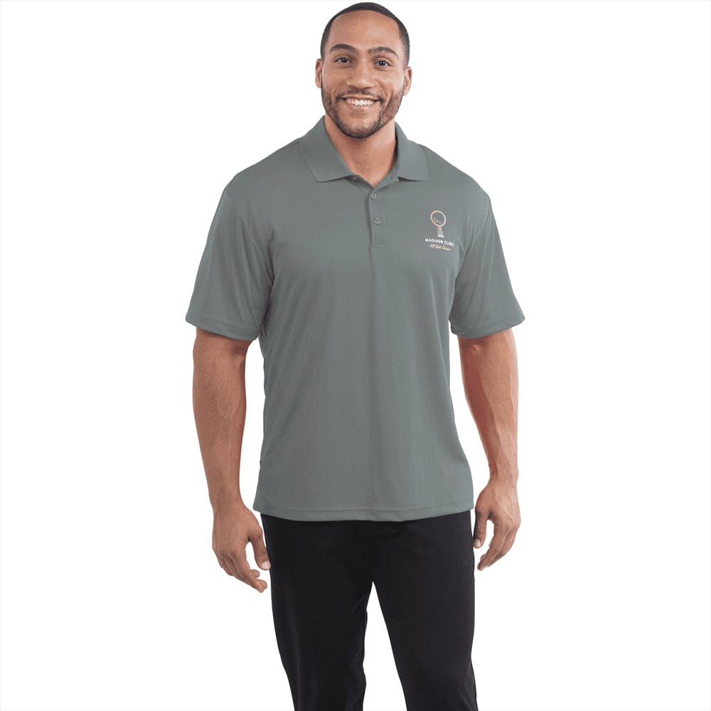 A man wearing a grey Moreno short sleeve polo shirt featuring a logo on the left side. Moreno Short Sleeve Polo - Mens - Image 1