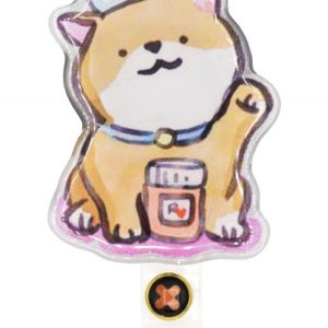 A badge reel featuring a cartoon dog in a nurse outfit, with a medicine jar, predominantly in beige and white colours.