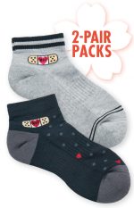 A pair of compression ankle socks, one in grey and the other in navy with polka dots, featuring a logo.