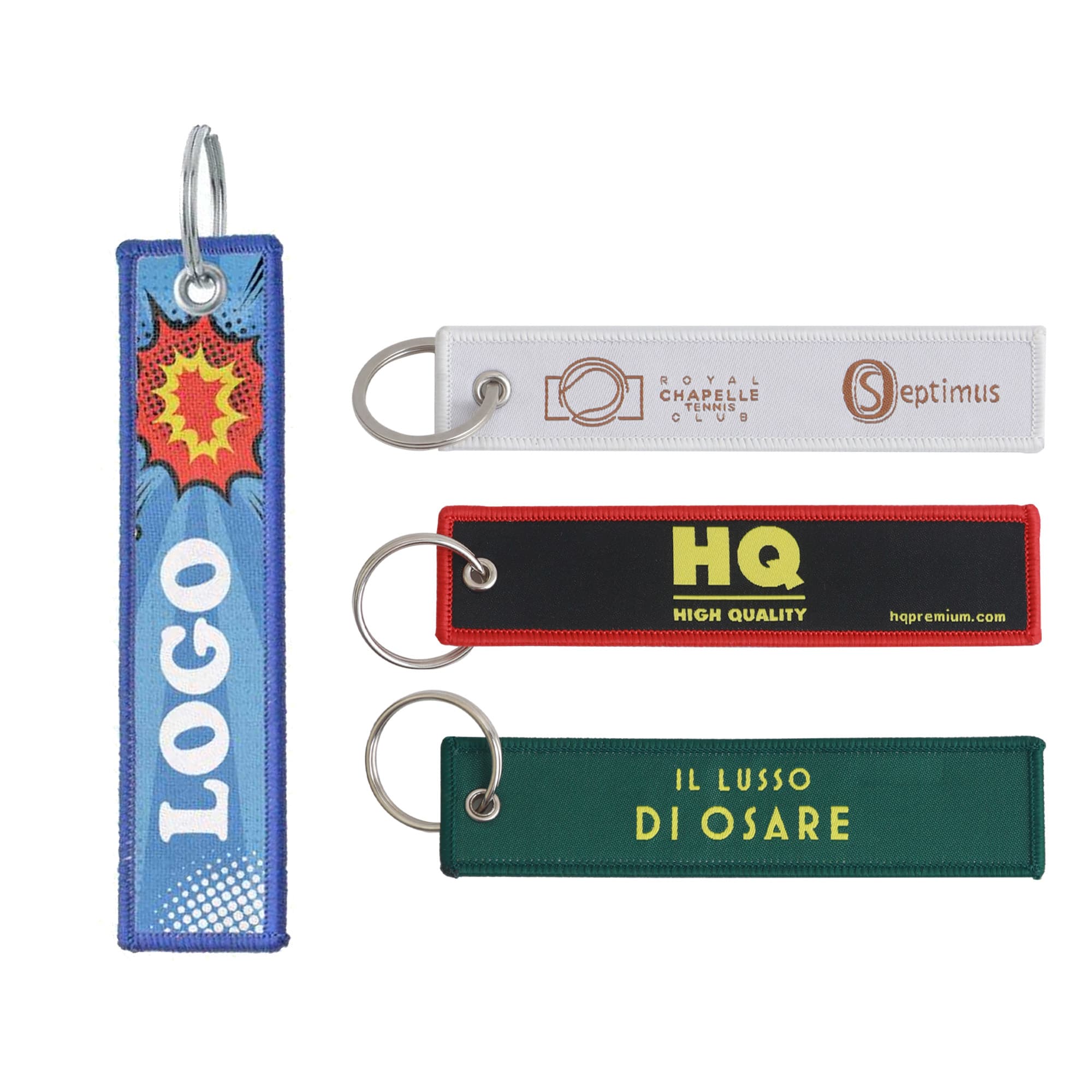 Woven key tags in various colours, featuring different designs and a metal keyring attachment. Woven Key Tag - Image 1