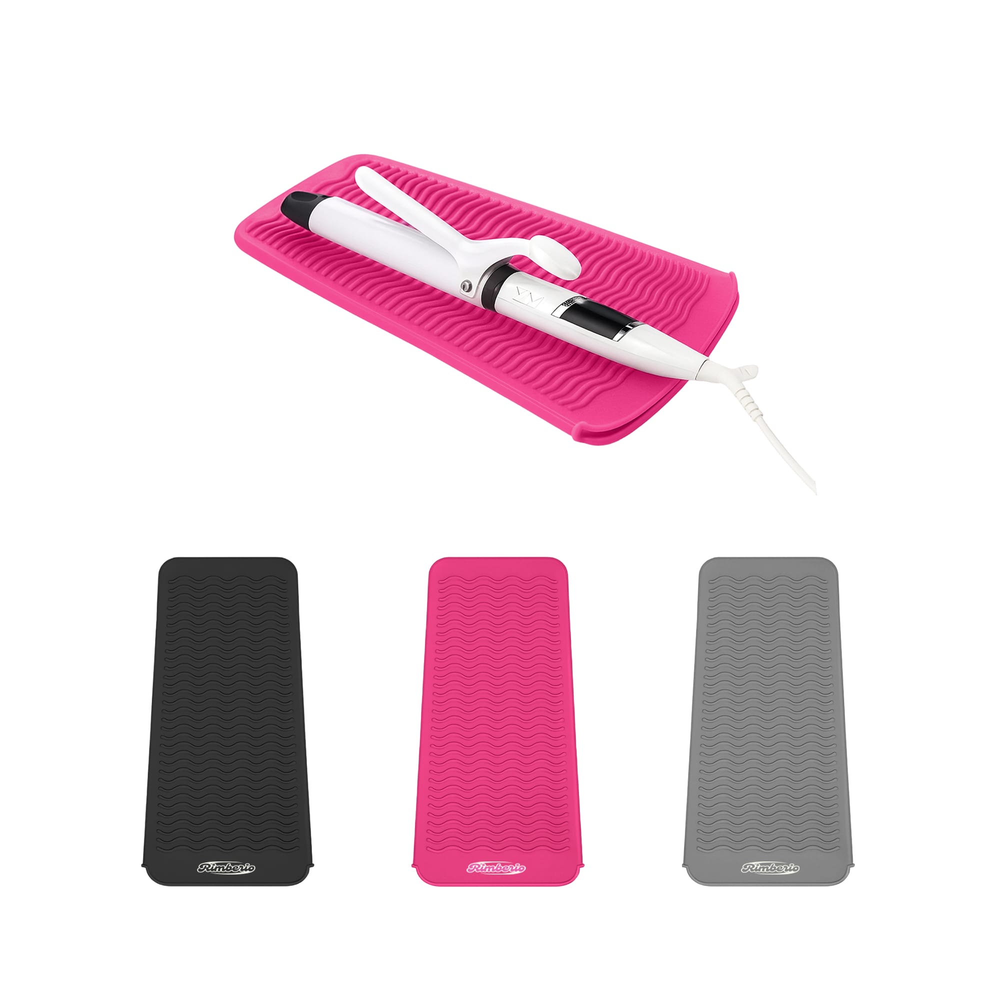 A pink heat resistant silicone mat pouch with a white styling tool on it, alongside black and grey mat options. Heat Resistant Silicone Mat Pouch - Image 1