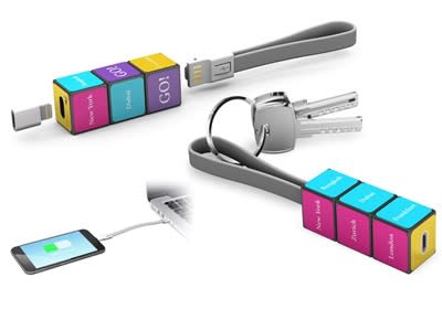 A multi-coloured Rubik's-themed mobile charging cable set with USB and lightning connectors, attached to a keyring. Rubik's Mobile Charging Cable Set - Image 1