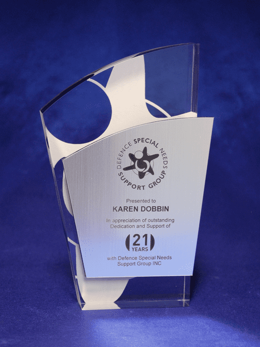 A contemporary acrylic trophy featuring a metalex facia with laser engraving, displaying a sleek design in clear and silver. Contemporary Acrylic Trophy with Metalex Facia and Laser Engraving - Image 1