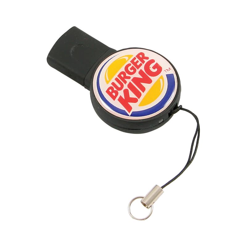 A black retractable Flashdrive with a circular logo featuring red and yellow elements. It has a keychain attachment. Flash By Design - Image 1