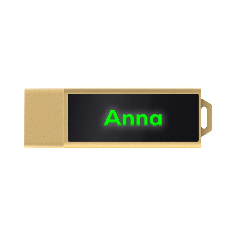 A gold eco-friendly LED flash drive with a black display area featuring the name "Anna" and a logo. Anna Eco LED Flash Drive - Image 1