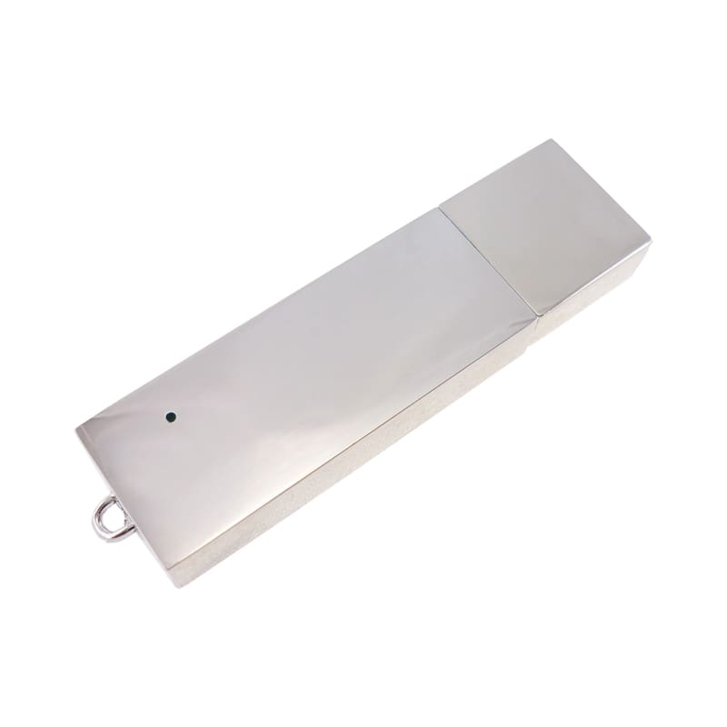 A slim, shiny silver flash drive with a sleek design and a small circular indicator light. Slimline Metal Drive - Image 1
