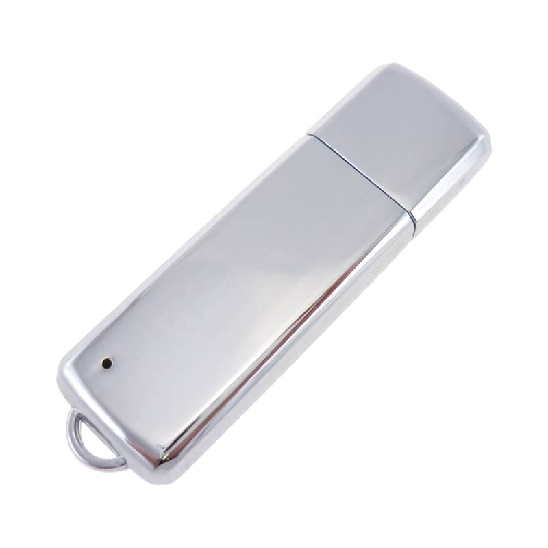 A sleek silver metal flash drive with a smooth surface and a loop for attaching to a keychain. Atillium Metal Flash Drive - Image 1