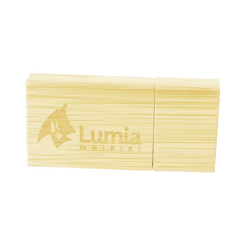 A bamboo USB drive in a natural yellow colour with a logo on the surface, featuring a sleek and rectangular design. Magnetic Bamboo USB Drive - Image 1