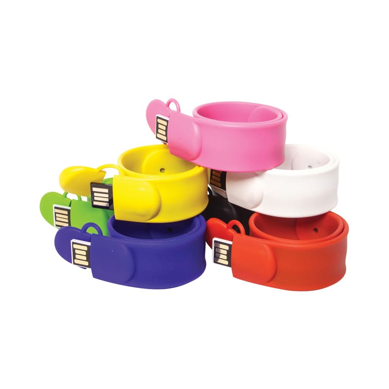 A collection of colourful silicone USB flash drives in pink, white, red, green, yellow, and blue. Each has a distinctive design. Slap On USB Flash - Image 1