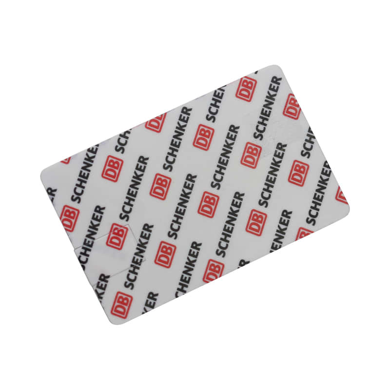 A credit card-sized flash drive with a white background featuring a red logo and repeated text pattern. Credit Card Micro Flash Drive - Image 1