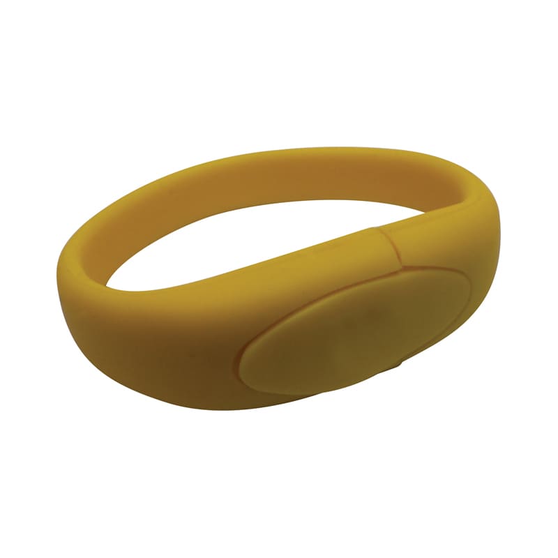 A yellow silicone wristband with a smooth surface and an oval button-like feature. It has a minimalistic design. Gigi Silicone Wrist Band - Image 1