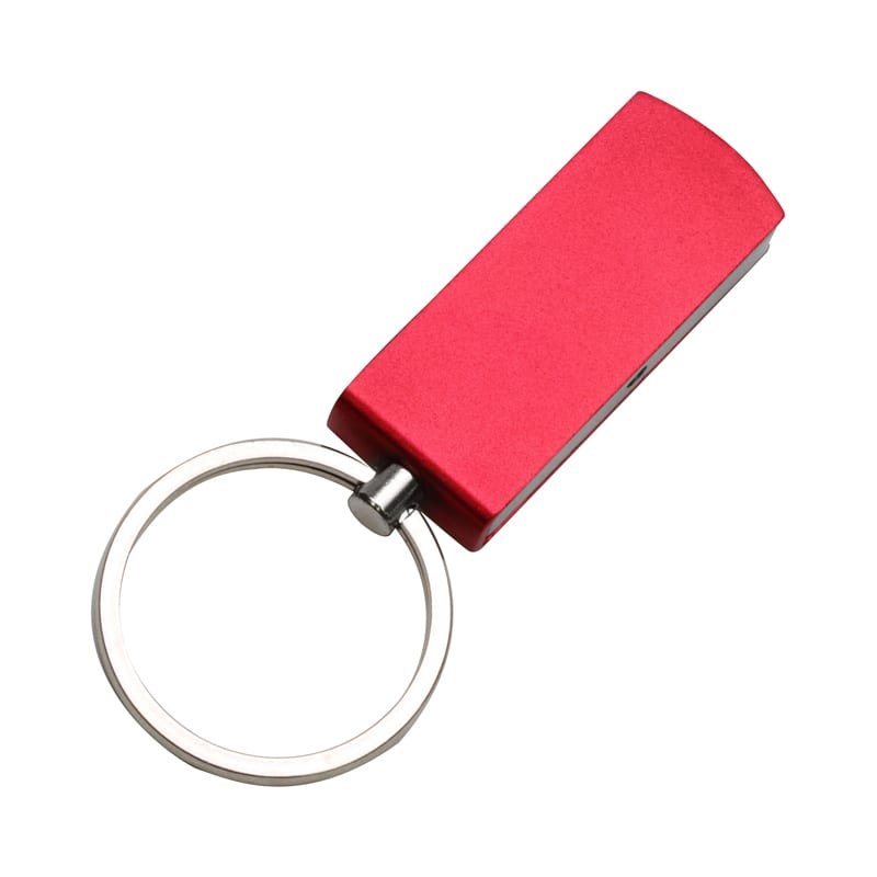 A red flash drive attached to a metal keyring. The device has a sleek, rounded rectangular shape and a logo. Triton Flash Drive - Image 1
