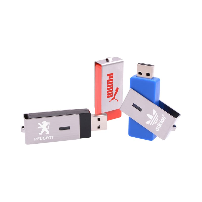 Four flash drives in various colours: silver, red, blue, and black, featuring logos on some. Ginan Swivel Flash Drive - Image 1