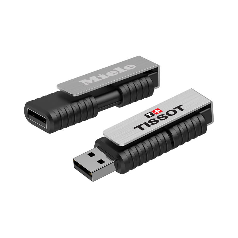 A silver and black flash drive featuring a textured design and logos, with USB-C and USB-A connectors. Meridian Flash Drive - Image 1