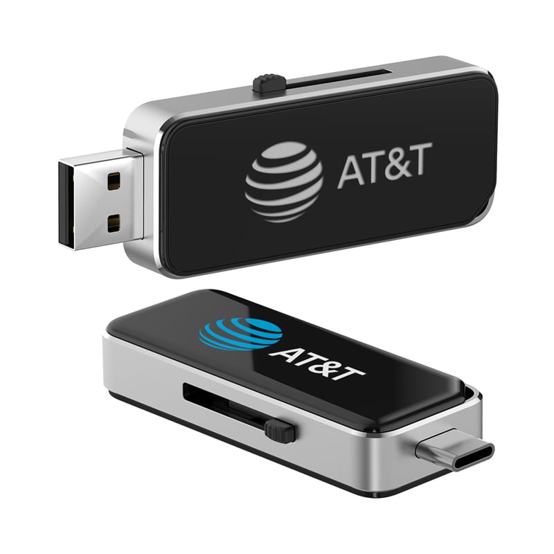 A metallic flash drive with a black casing, featuring a logo. It has both USB and Type-C connectors. Oak Type-C LED Flash Drive - Image 1