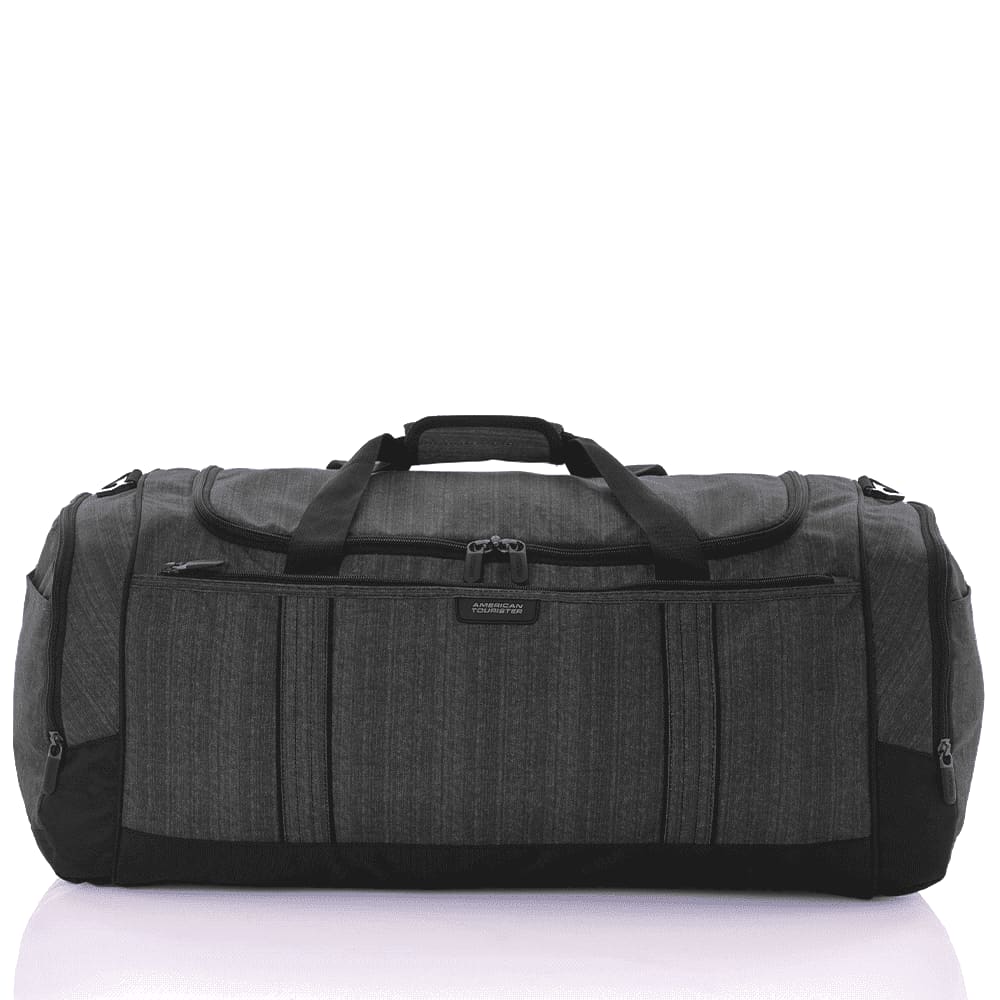 A grey duffle bag with black accents featuring multiple zippered pockets and sturdy handles. American Tourister 1451 X-Bags Duffel 67cm - Image 1