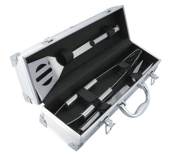 A BBQ set in a silver case, featuring a spatula, tongs, and a fork, with black accents. Entertainer BBQ Set - Image 1