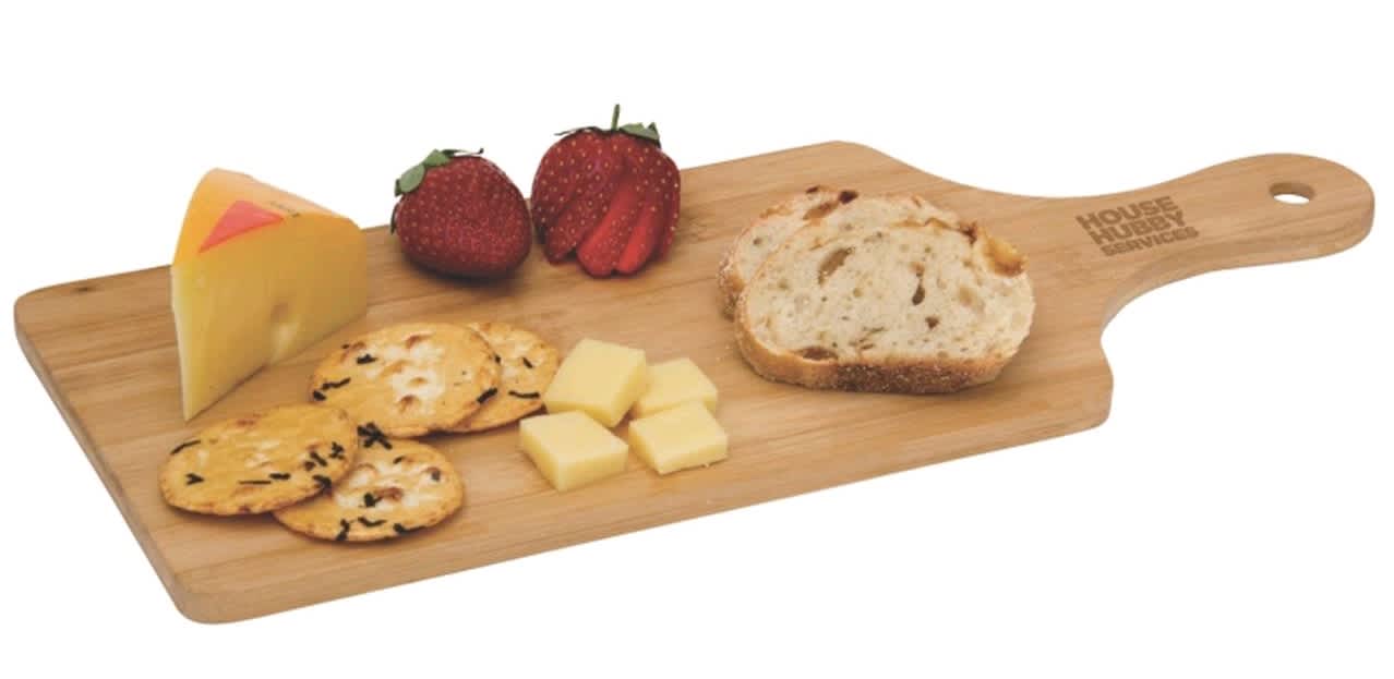 A wooden cheese board with slices of cheese, crackers, bread, and strawberries, featuring a logo on the handle. Le Gourmet - Image 1
