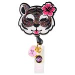 A retractable badge featuring a glittery tiger face design with a pink flower and charm accents in black, white, and pink.