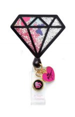 A black and pink diamond-shaped retractable badge holder with sparkling details and decorative charms.