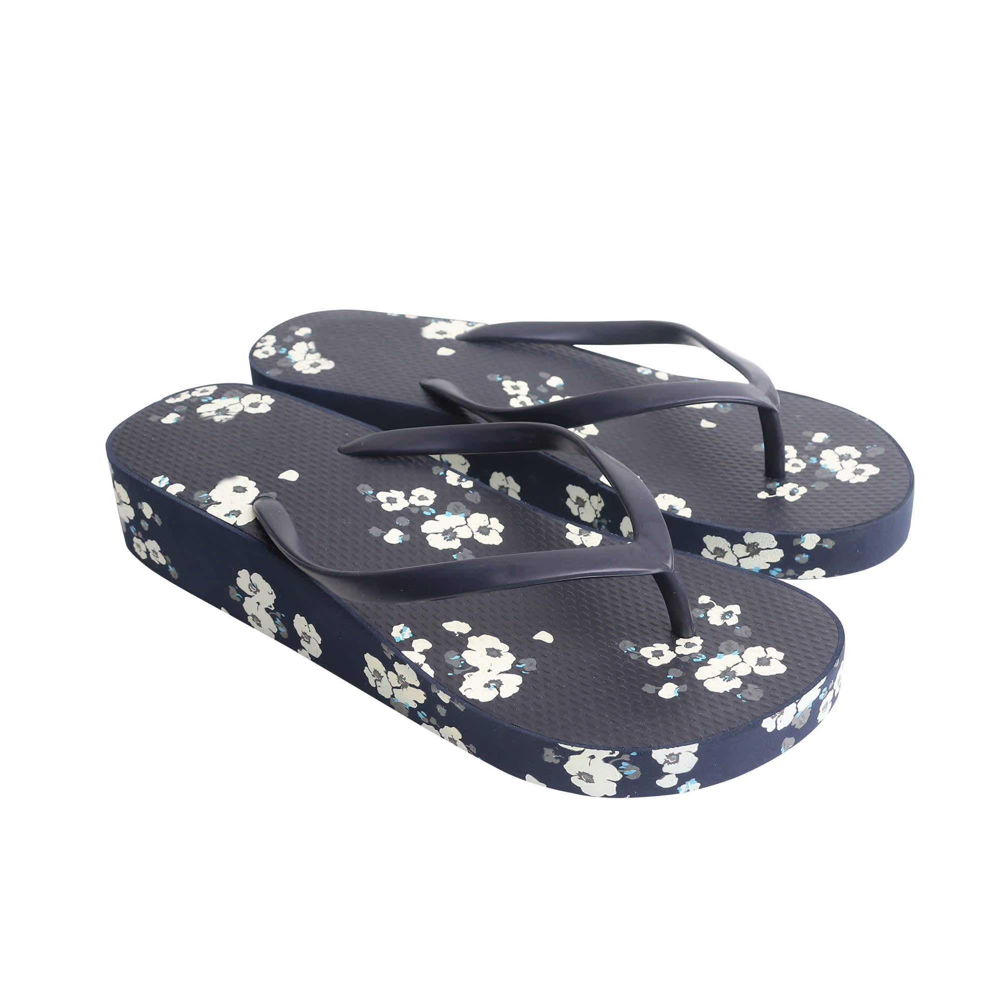 Rubber platform thongs in navy with a floral pattern, featuring black straps and a textured sole. Rubber Platform Classic Thongs - Image 1