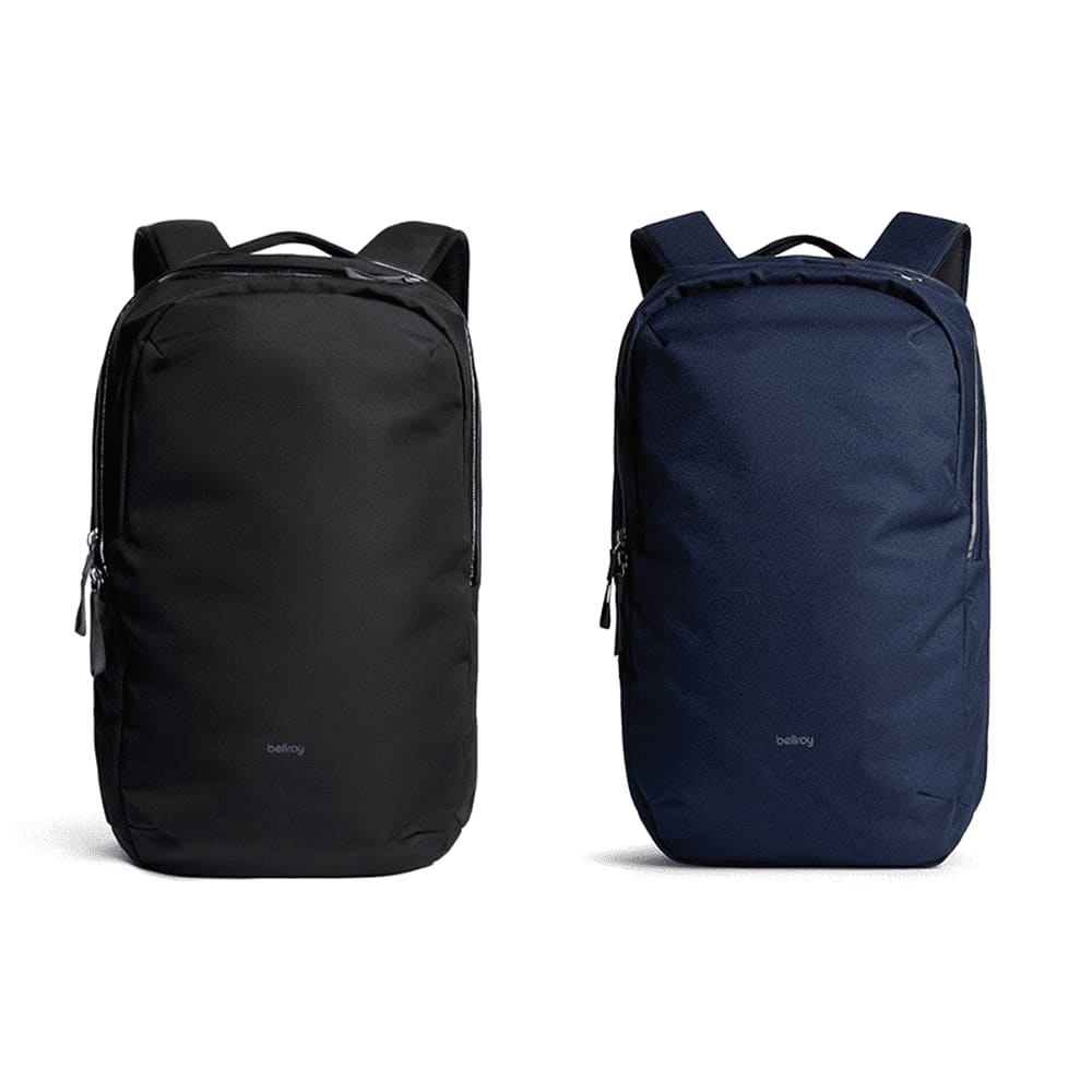 A black and a navy blue Bellroy Via Backpack 20L displayed side by side, featuring a logo and a sleek design. Bellroy Via Backpack 20L - Image 1