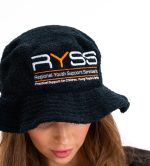 A black terry towelling bucket hat features a logo and is made of soft, textured fabric.