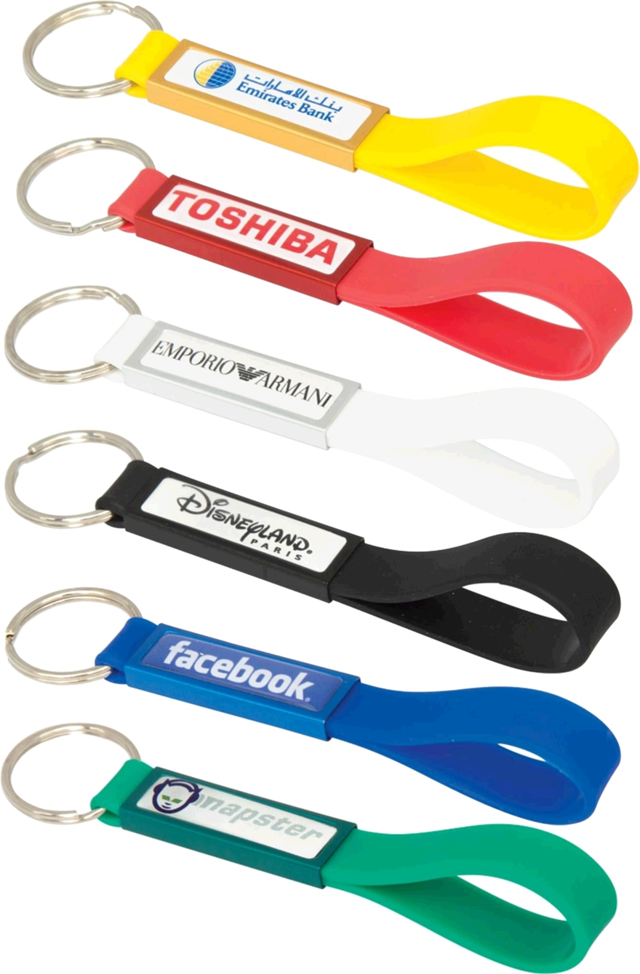 A collection of silicone sling keyrings in various colours, featuring different branding and a dome-indent design. Silicone Sling Keyring with Dome-Indent - Image 1