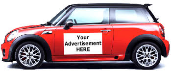 A red car with a blank space for an advertisement on its side, featuring a sleek design and alloy wheels. Car Magnet - Image 1
